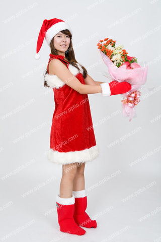 꽃다발 들고 있는 여성 산타 이미지 미리보기